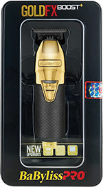 A gold and black CONAIR BABYLISSPRO TRIMMER-OUTLINER FX787GBP BOOST GOLD, packaged in a black box with a clear window displaying the product.